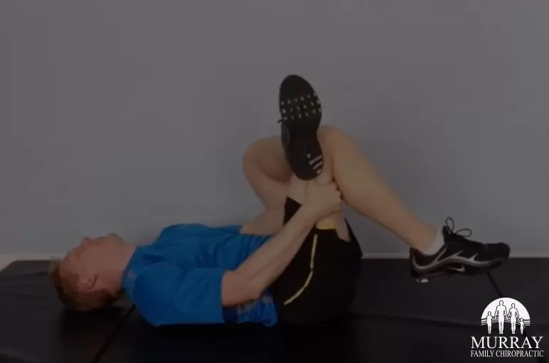 Dr. Rob Murray showing a hip stretch for low back pain